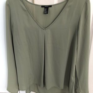 Green v neck blouse